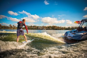 With new technologies, ski boats can produce large, asymmetric waves ideal for surfing. (Photo courtesy of Nautique)